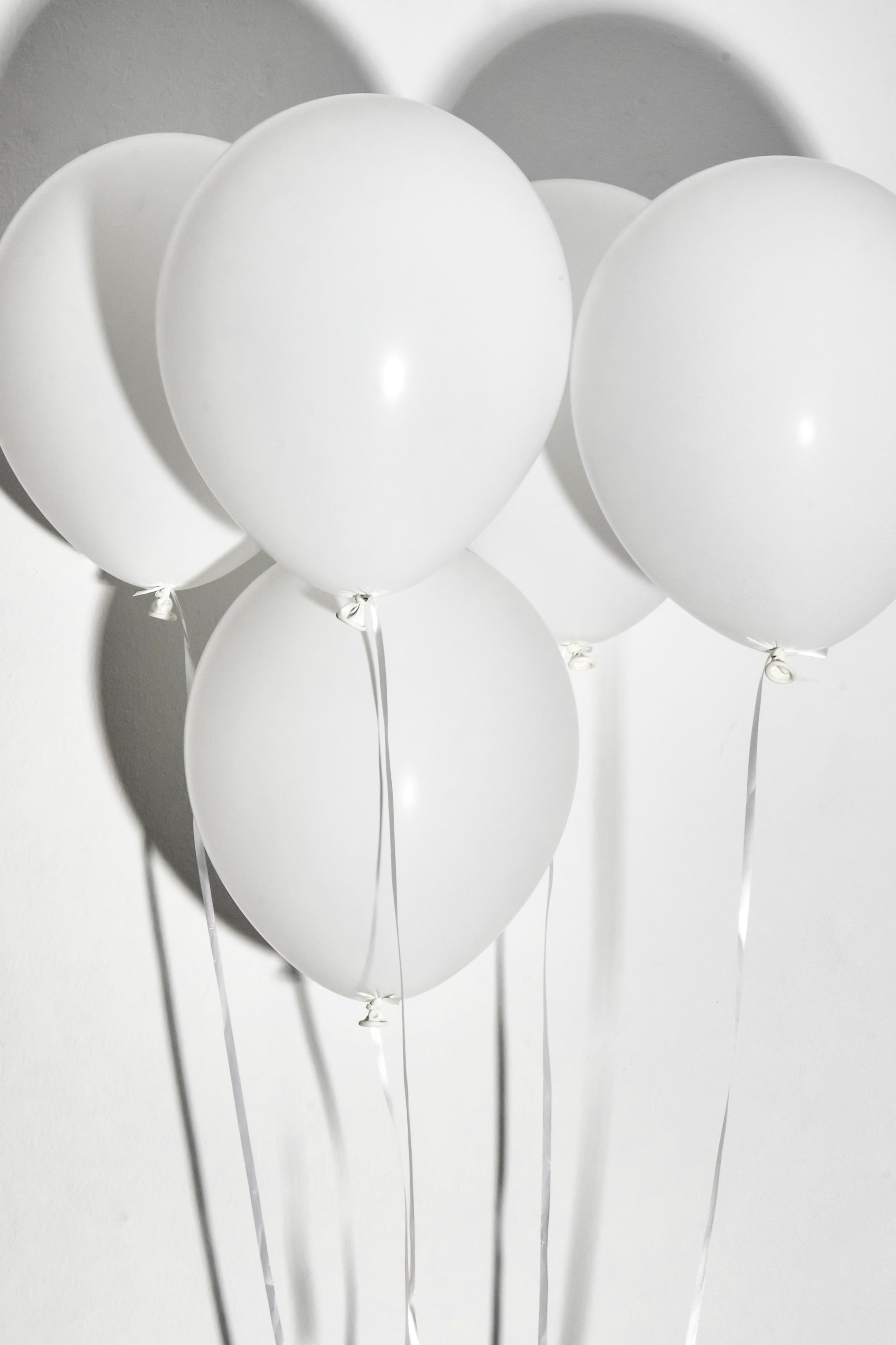 Floating White Balloons